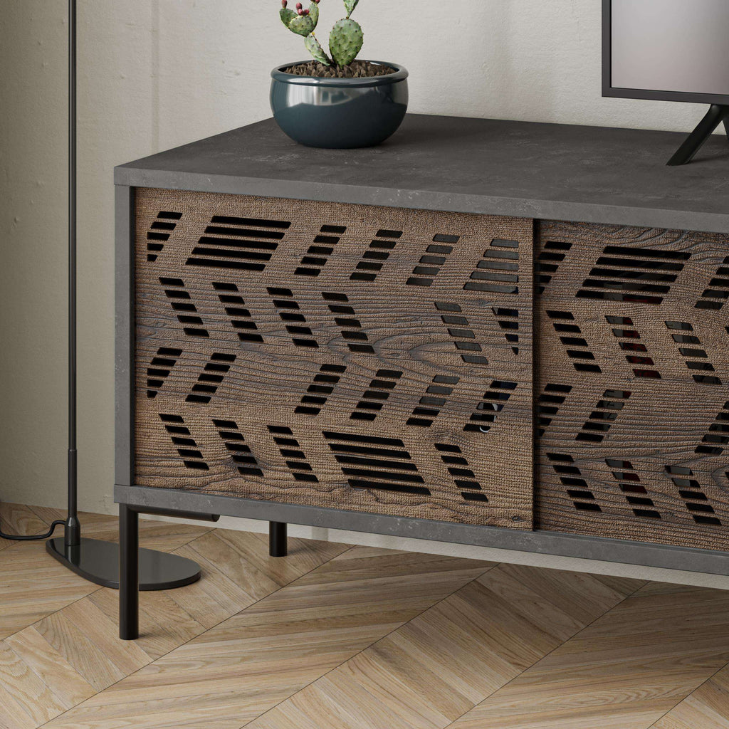 Dark grey TV stand cabinet with patterned perforated doors and open media compartment