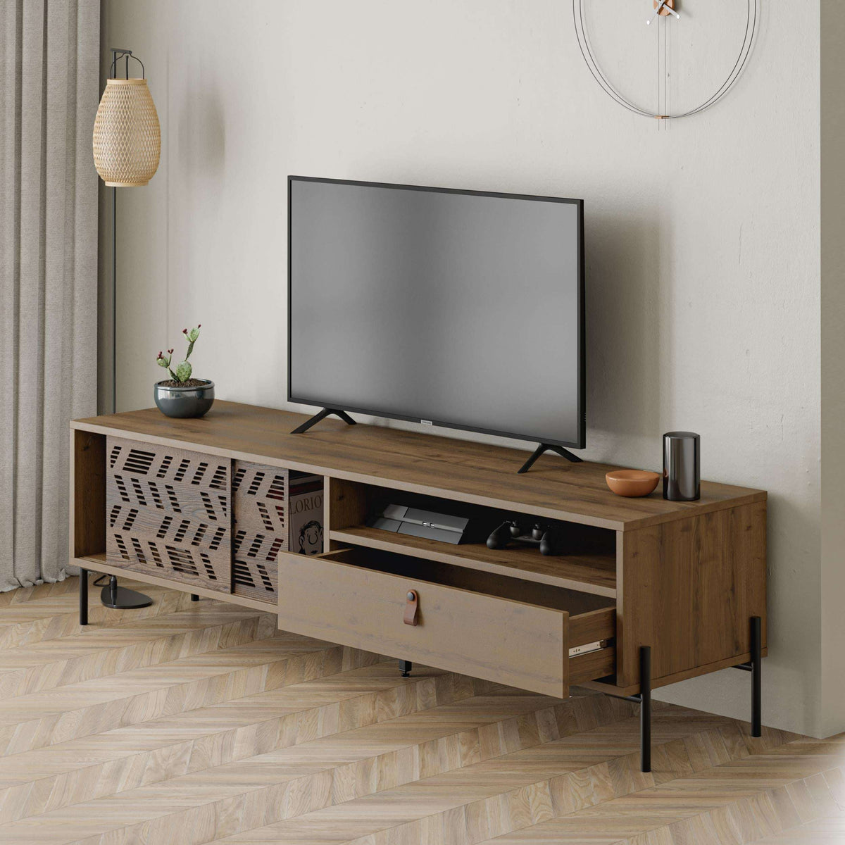 Modern TV stand with patterned side doors, open media shelf, and white storage drawer
