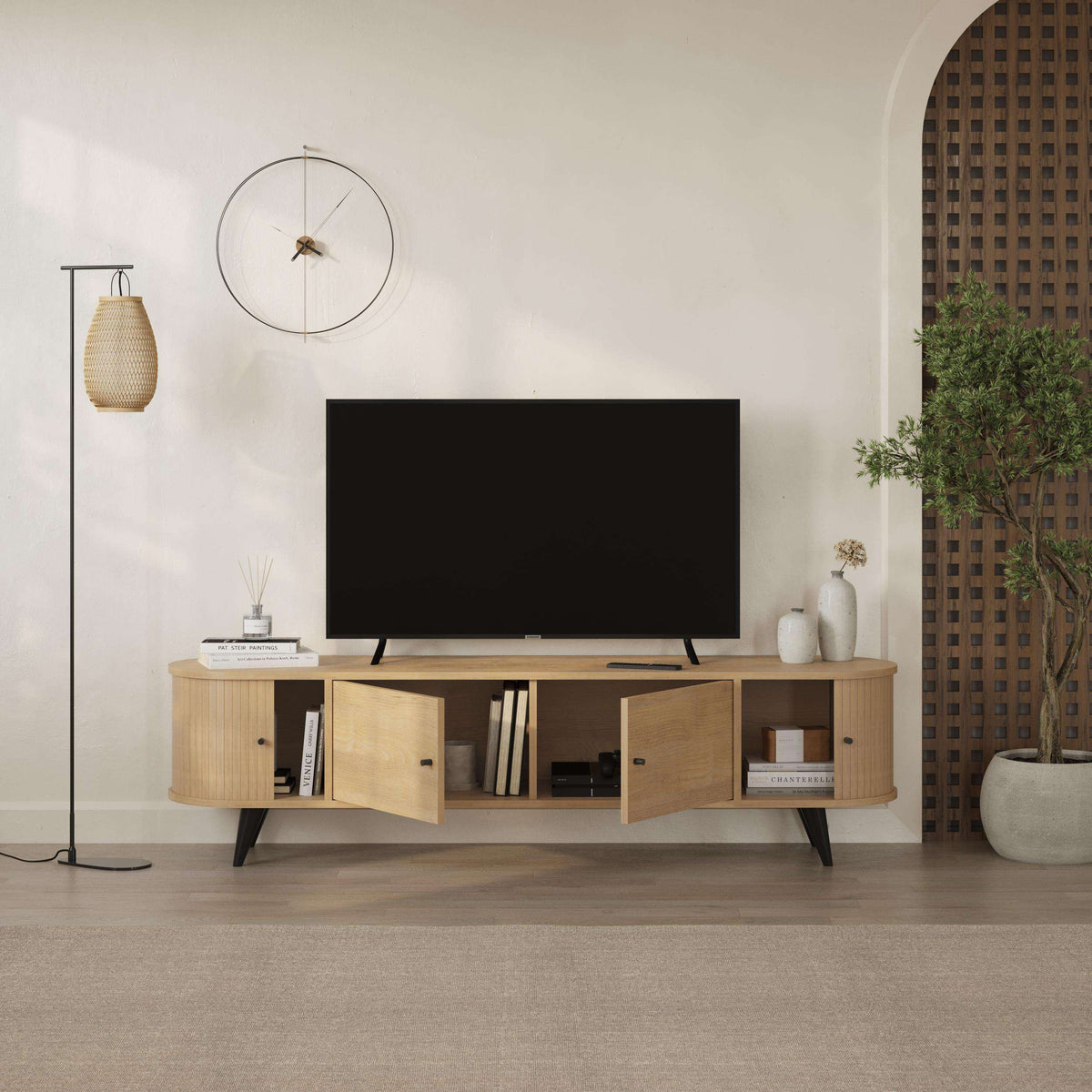 Sapphire Oak TV stand with four doors, curved silhouette, and media shelf