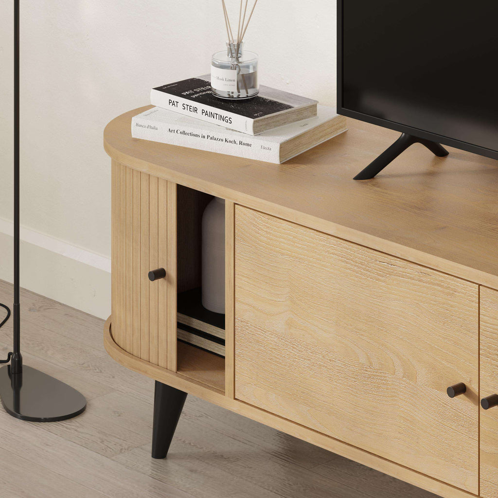 Oak TV stand corner with open compartment and woodgrain cabinet fronts