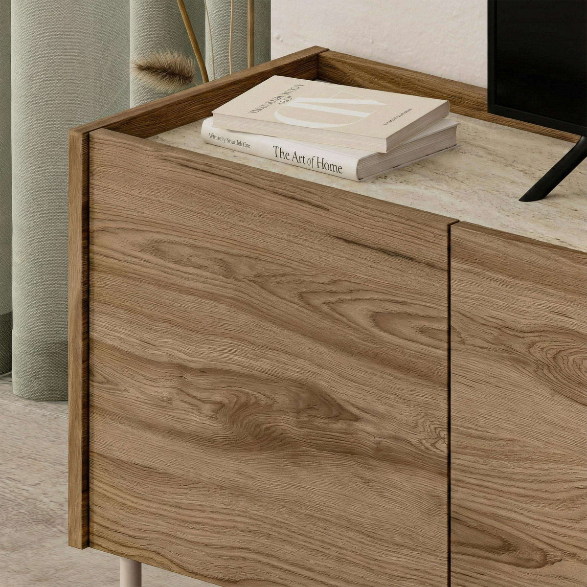 Natural oak TV unit cabinet door with visible wood grain and slim metal legs
