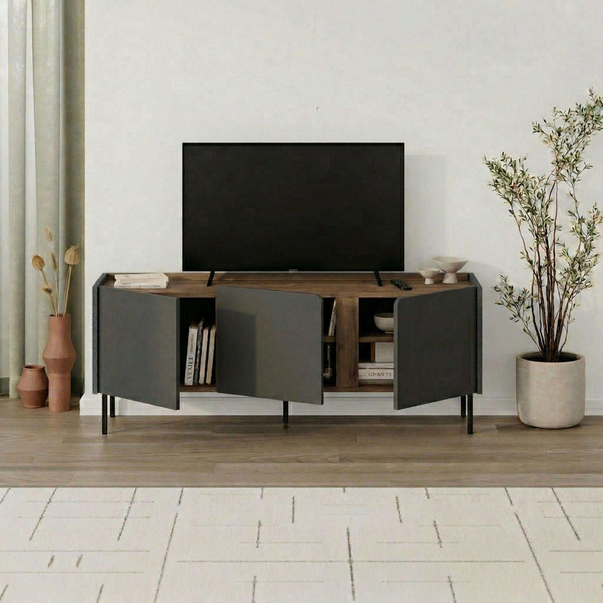 TV unit three-door media console with light gray doors and natural oak interior shelves