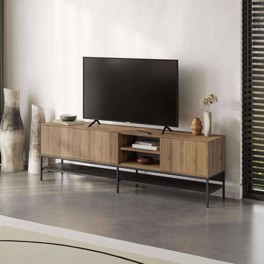 Modern TV stand with light wood front panels, open cubby, and black metal frame