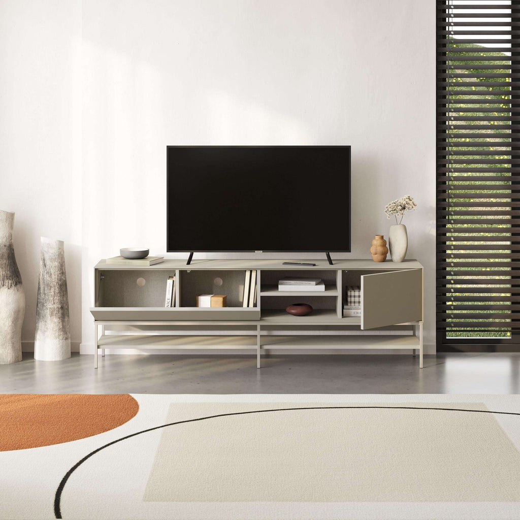Amira TV unit with TV on top, open cubby storage, and side drawers in light grey