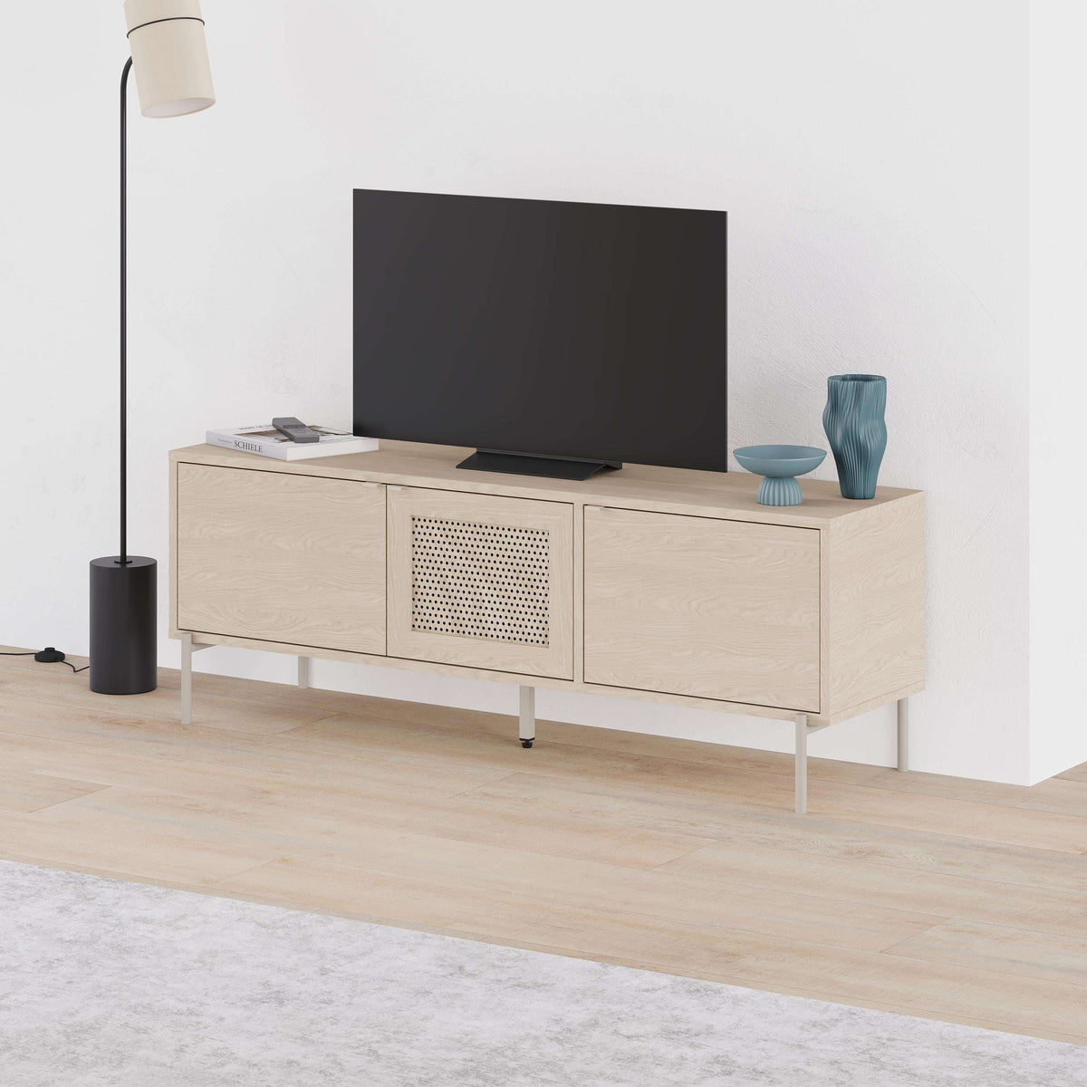 Sonoma oak media console with perforated center door and two lower drawers