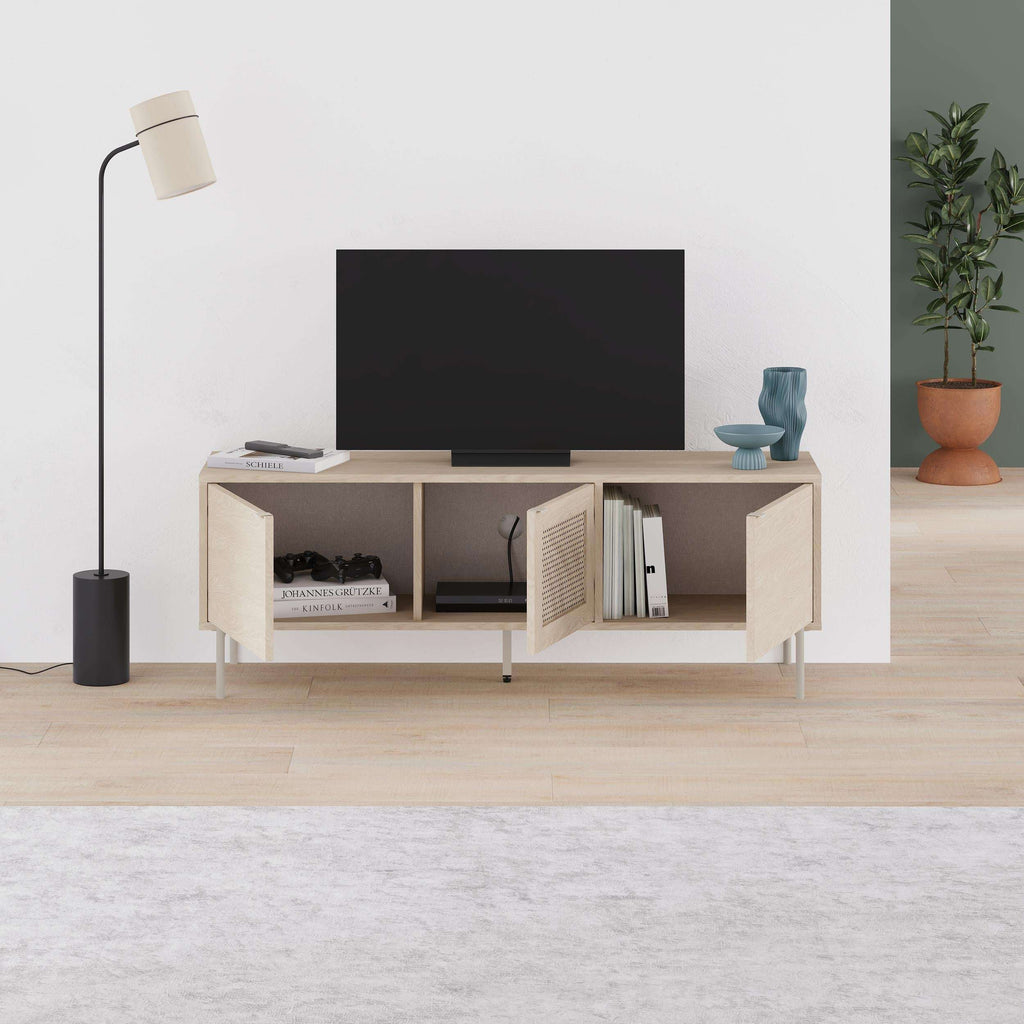 Sonoma oak TV stand with center door open, showing inner shelves and perforated panel