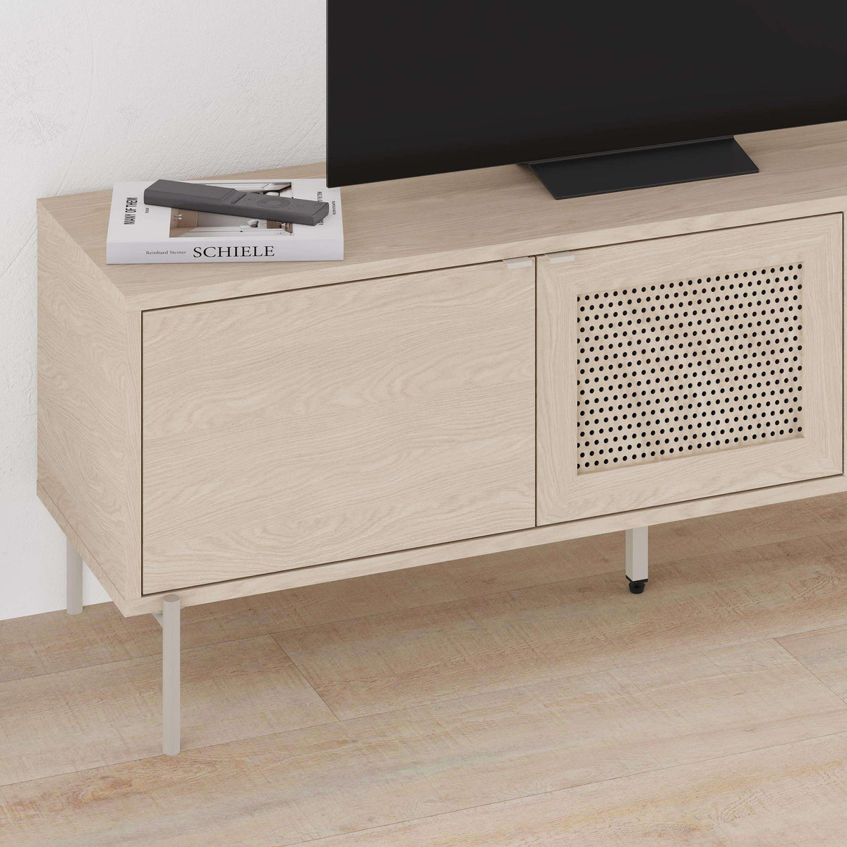 Sonoma oak door panel with laser-cut perforated grille on modern media console