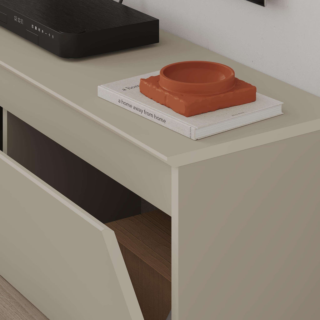 TV low board storage compartment with interior shelf and orange decorative dish.