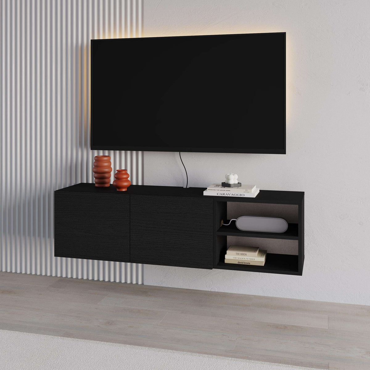 Black wall-mounted TV unit with two doors and open shelves for up to 50-inch TV