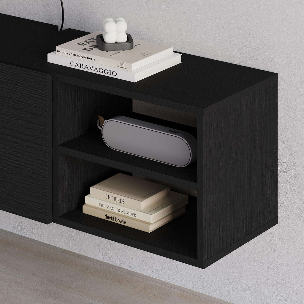 Black TV unit with open cubby shelves and side storage compartment
