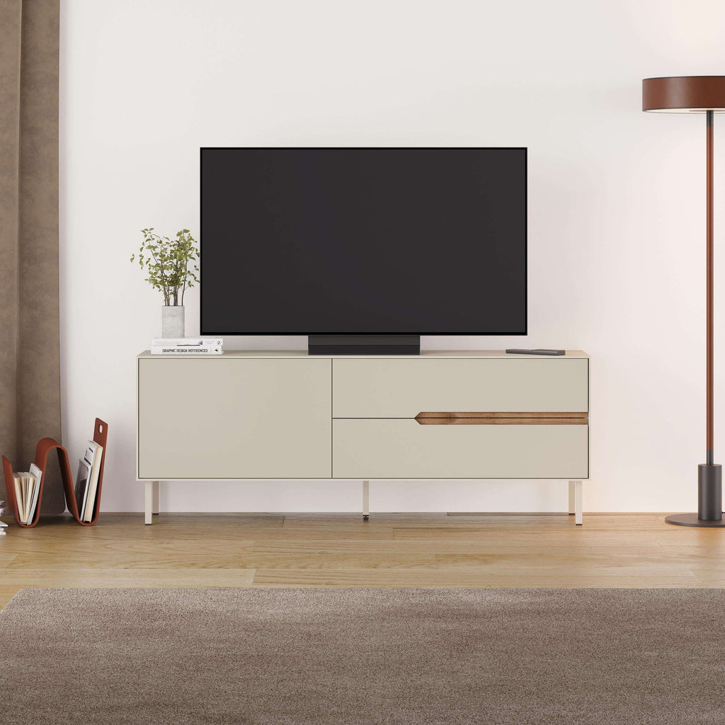 Modern TV unit with two-door storage and central drawer, light sand finish, wood handle.