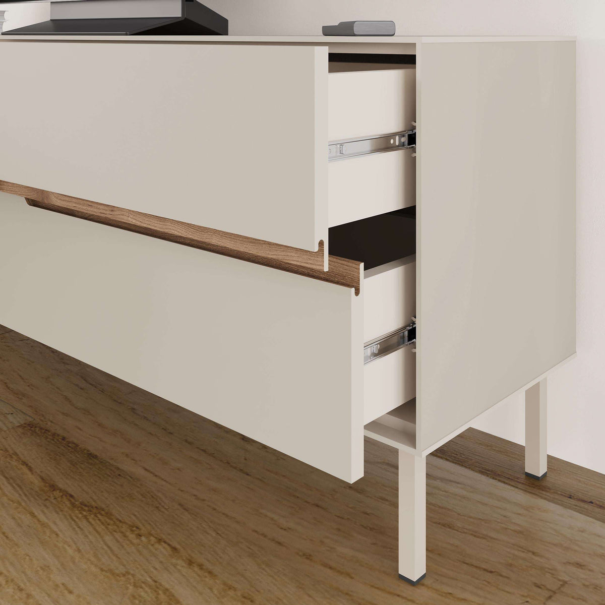 Modern TV unit showing open drawer and inner shelves with metal rails, light sand finish.