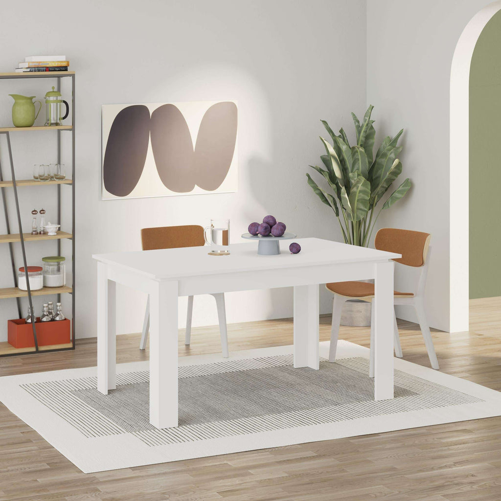 White extendable modern dining table with rectangular top and four straight legs