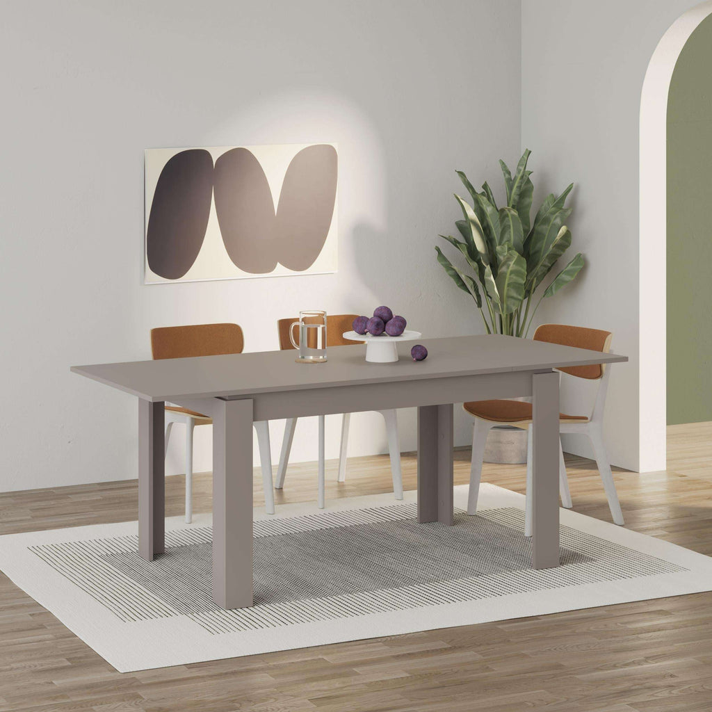 Light mocha extendable dining table with smooth rectangular top and straight support legs