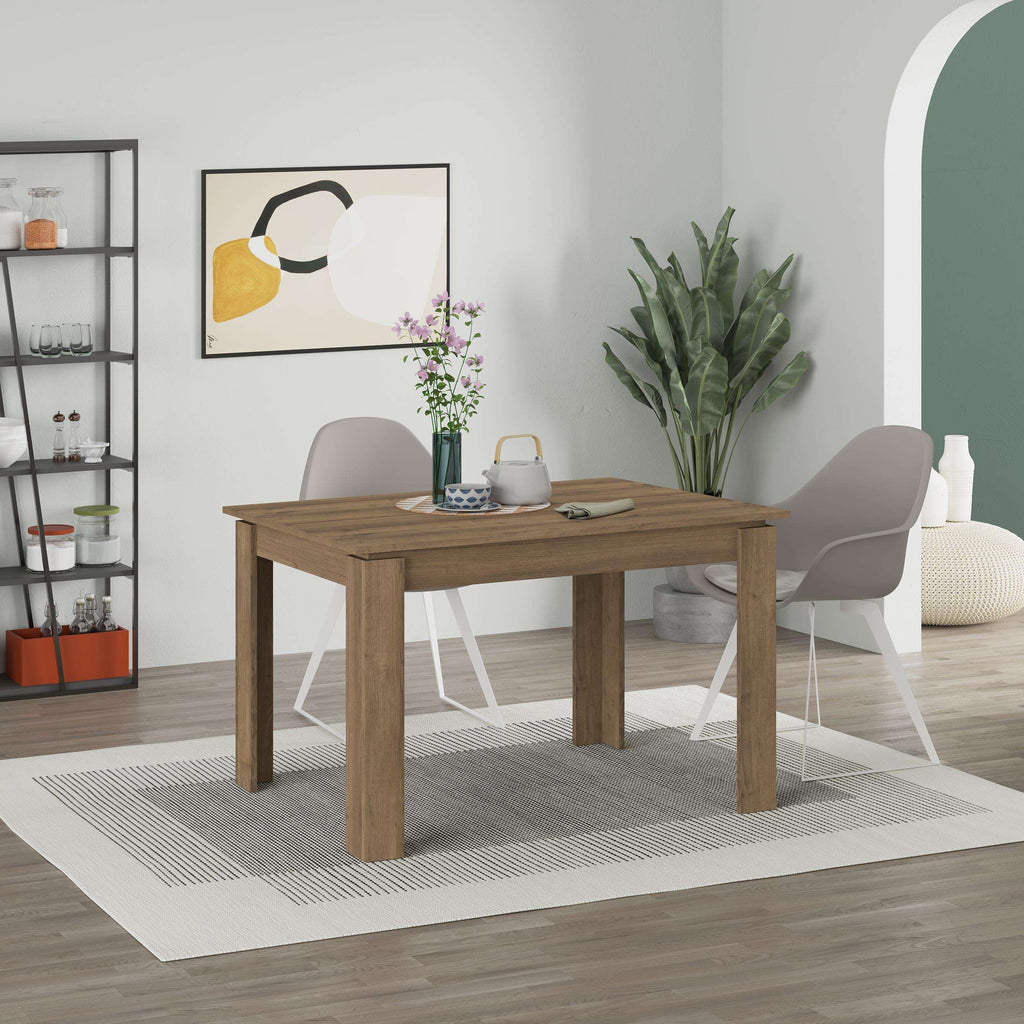 Dark oak extendable dining table with four legs and rectangular tabletop