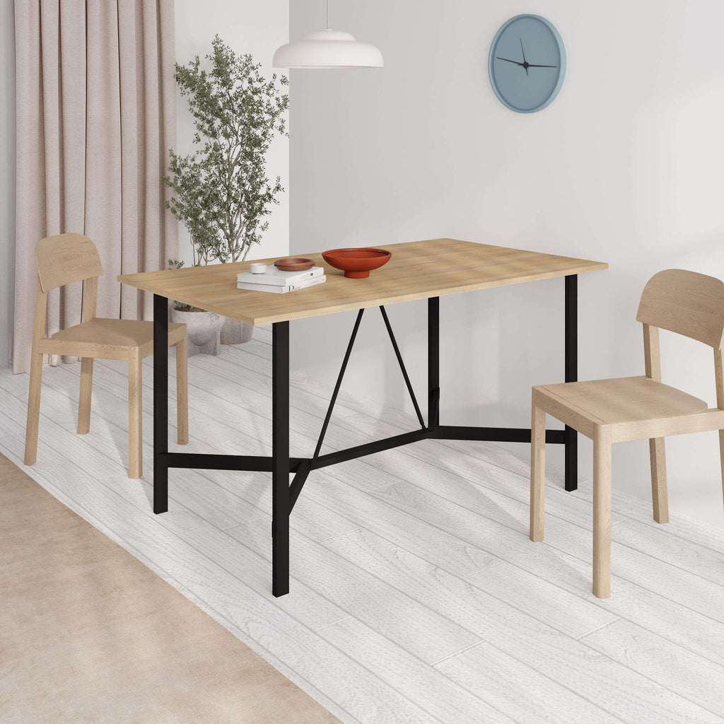 Dining table with light wood top and black cross-brace legs, rectangular 140 cm style