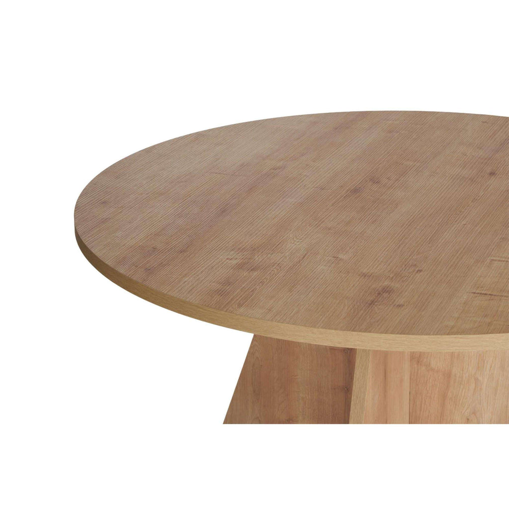 Round dining table with light wood top and three-sided pedestal base