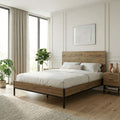 Mars bed frame in whiskey oak with low headboard, black legs, and platform base
