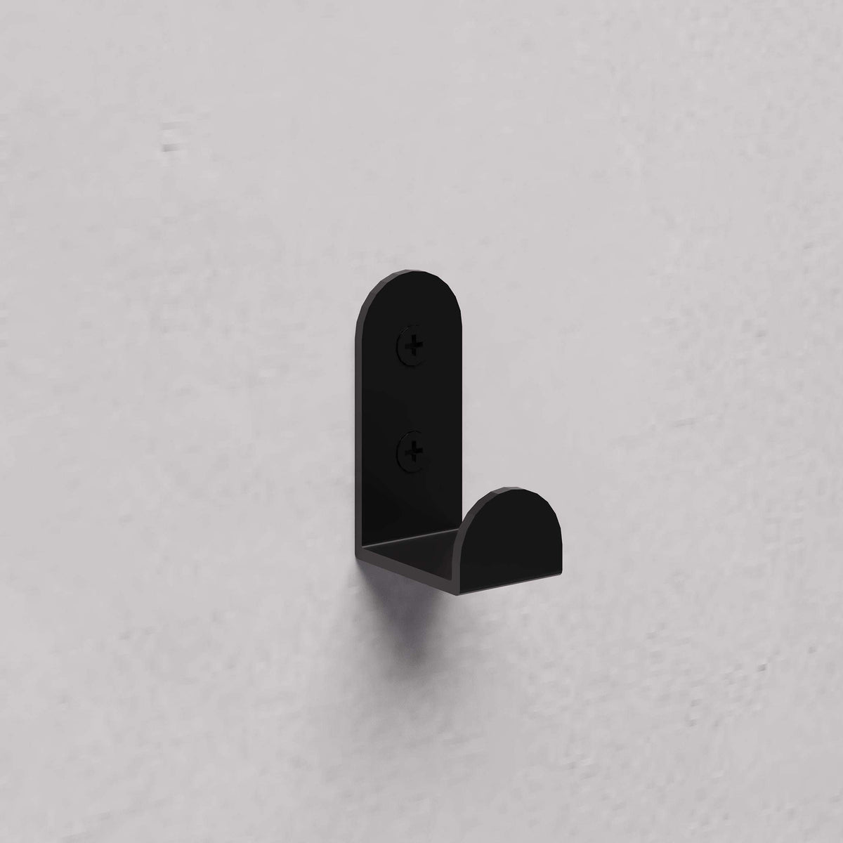 Black metal wall hanger hook with curved arm and two screw mount points