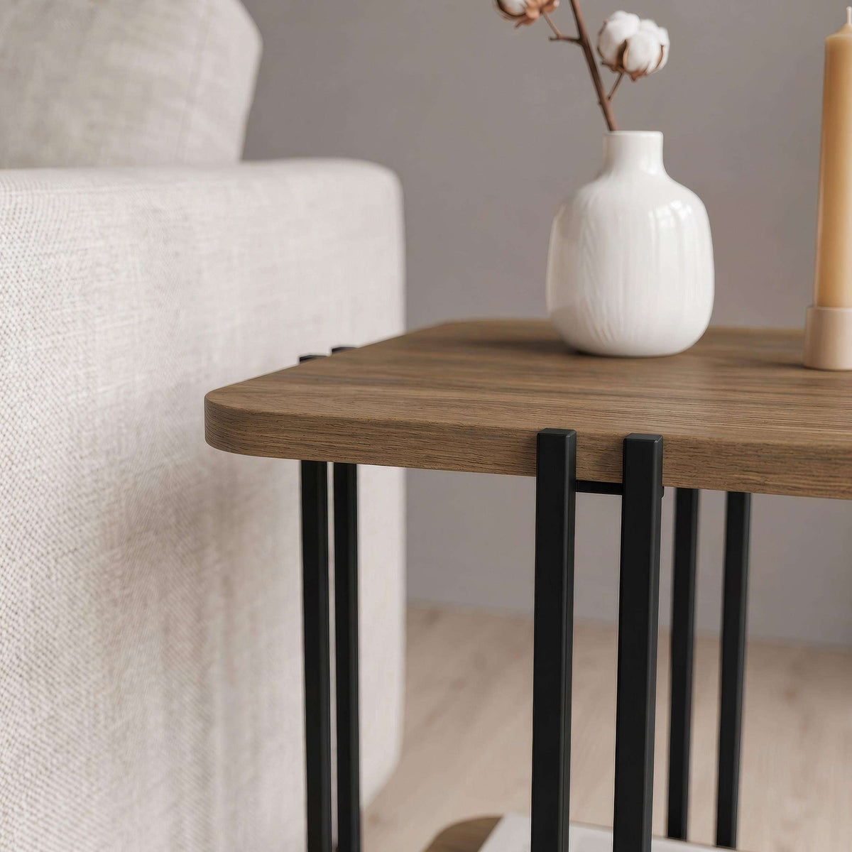 Two-tier side table with dark wood top, black frame, and lower shelf.