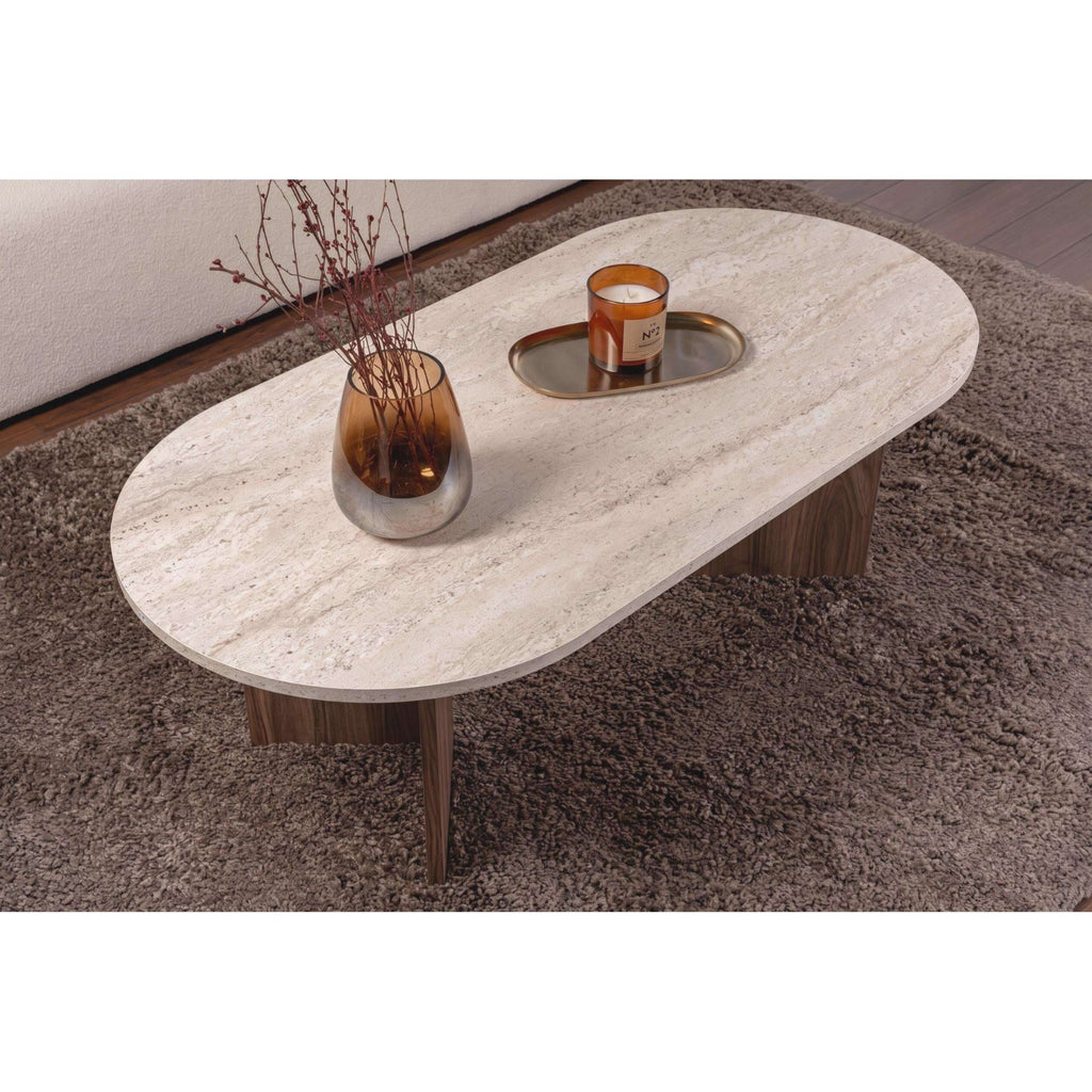 Oval coffee table with light stone top and dark wood pedestal legs