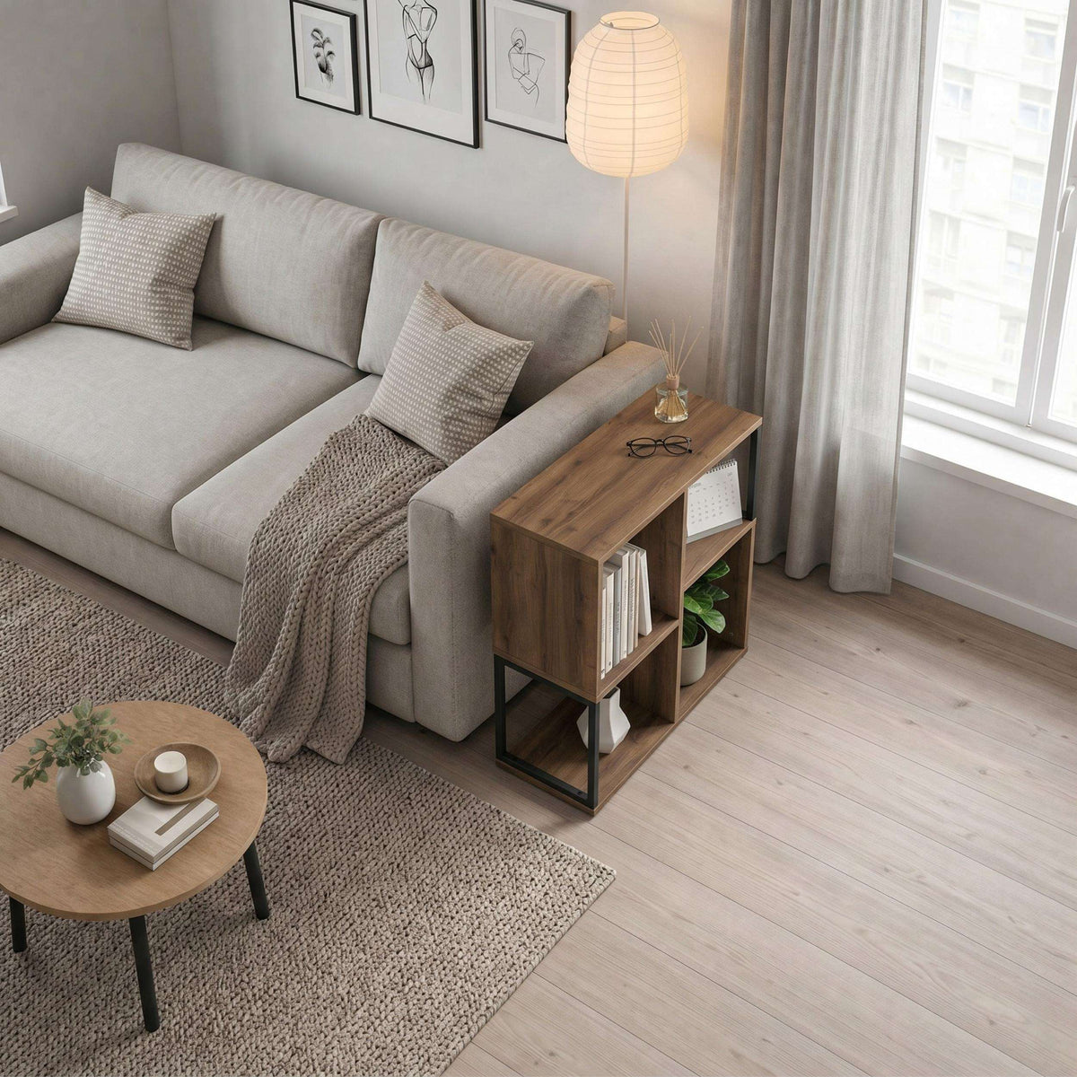Light wood mini bookcase side table with open cubby shelves beside sofa