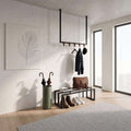 Black wall shoe rack with metal rail, five hooks, and open frame shelf for shoes