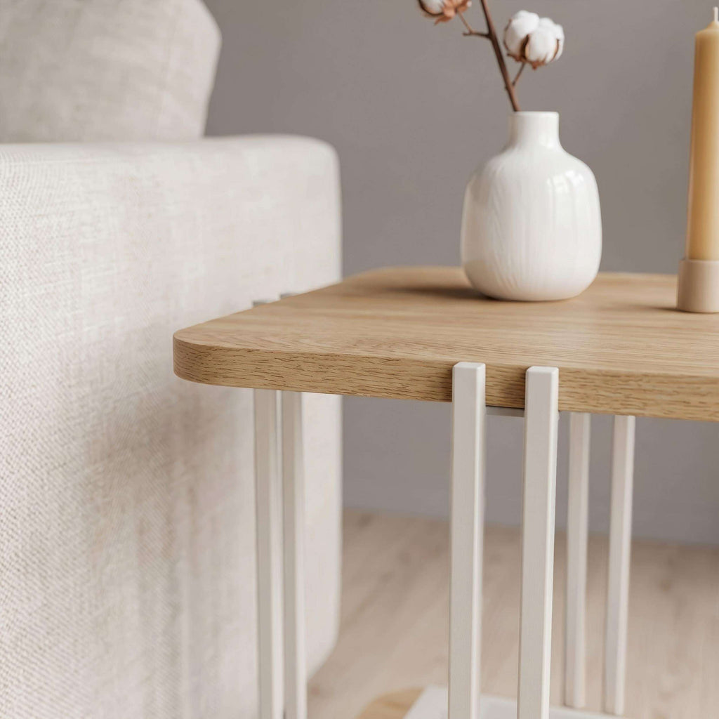 Two-tier side table with light wood top, white frame, and lower shelf.