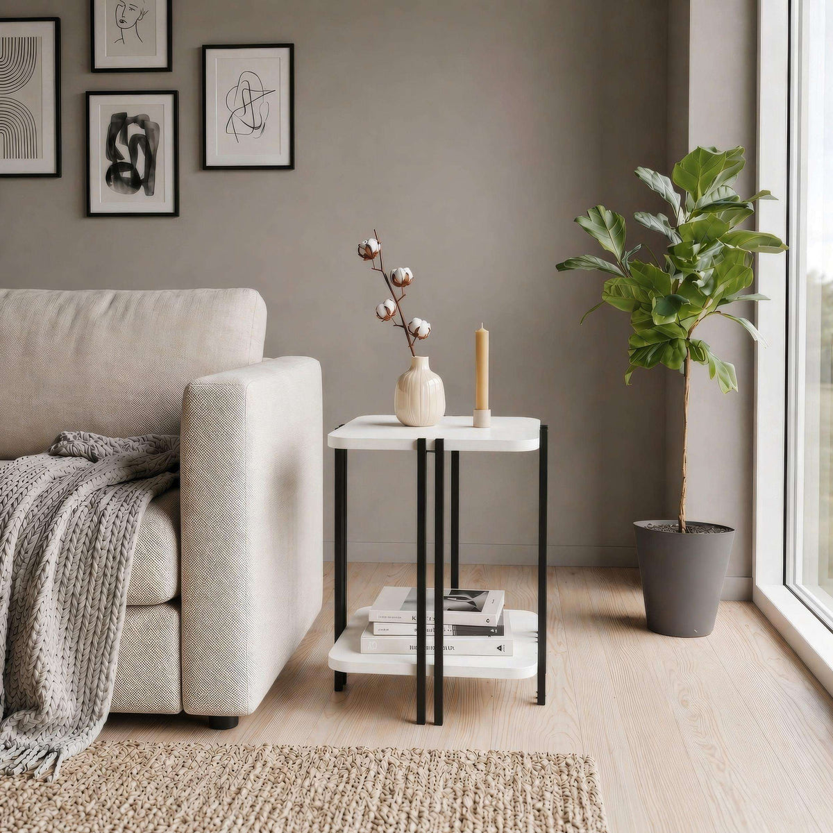 Two-tier side table with white top, black frame, and lower shelf.