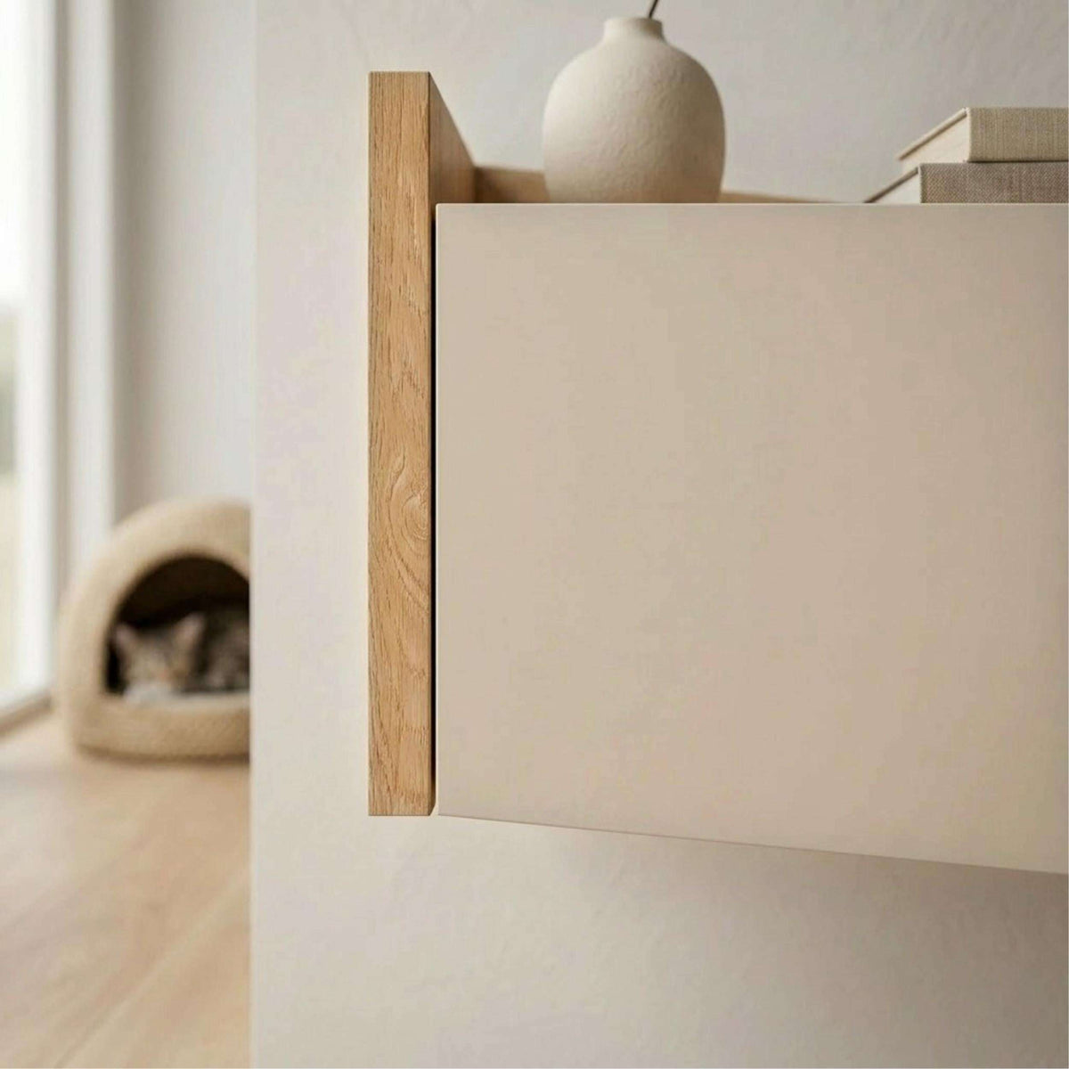 Floating bedside table drawer front with light wood side panel and open shelf above