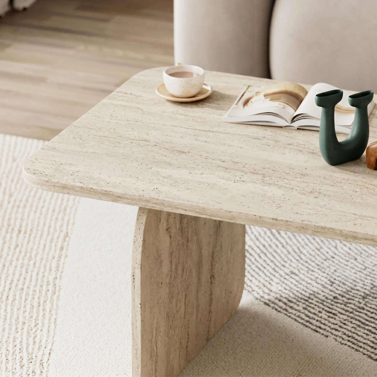 Travertine radius coffee table with rounded corners and pedestal base