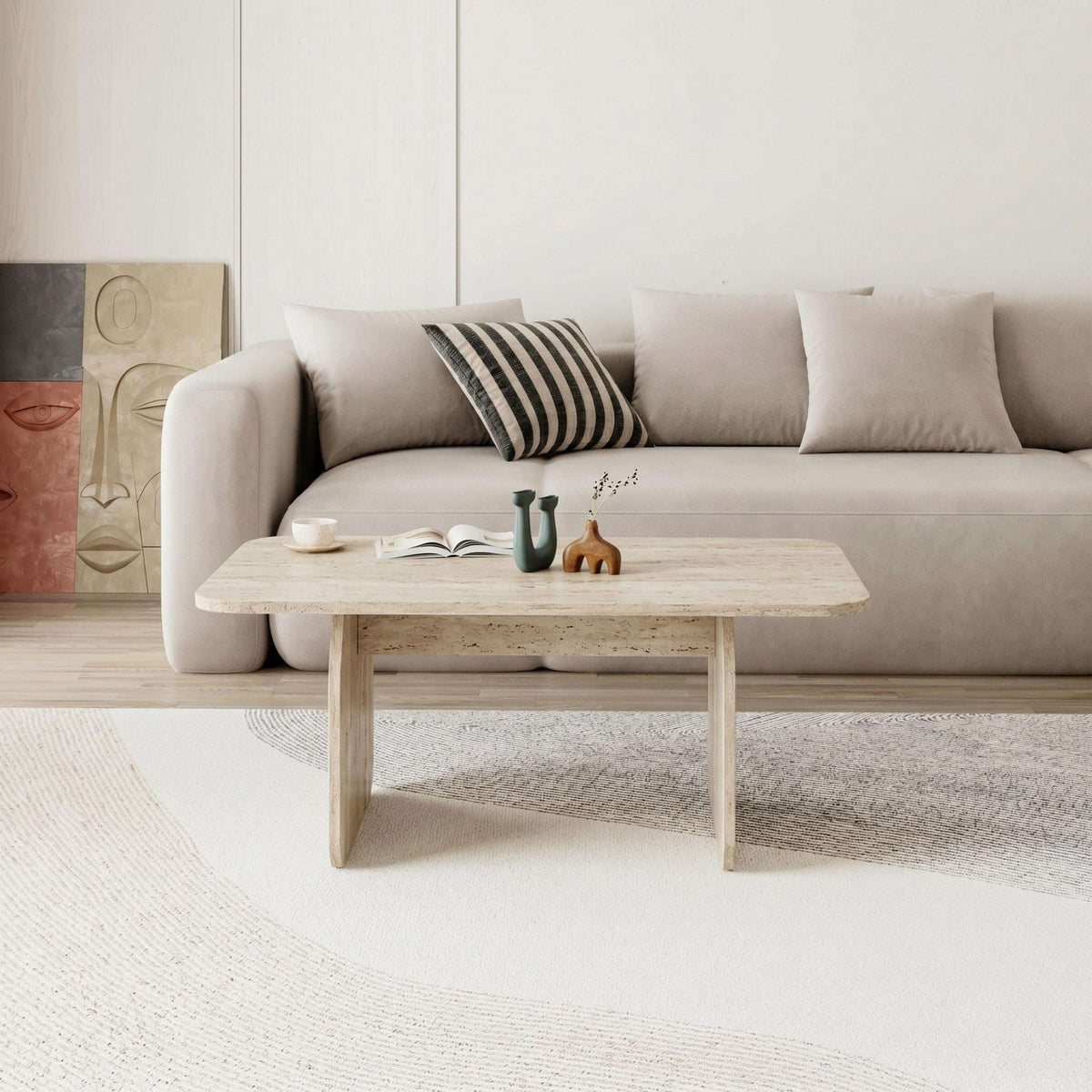 Travertine coffee table with rounded rectangular top in a living room setting