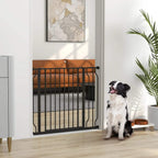 Black pressure-mounted dog safety gate installed in a doorway, with vertical bars