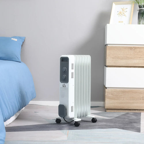 Portable white oil-filled radiator heater standing on floor with caster wheels