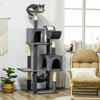 Dark grey cat tree with multiple levels, hanging hammock and enclosed cat houses