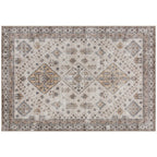 Beige vintage area rug with ornate medallion pattern and detailed border