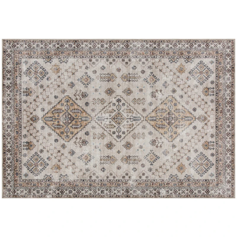 Beige vintage area rug with ornate medallion pattern and detailed border