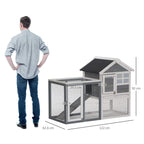 Two-tier wooden small animal hutch with ramp, grey roof, wire mesh panels and doors