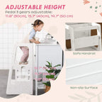 White adjustable kids step stool with child using the top level and side handle