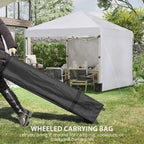 White pop-up gazebo with black wheeled carrying bag and rolled sidewall fabric on grass