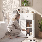 White cabinet with top drawer and open shelving behind double doors