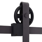 Dark barn door roller assembly with wheel and wall bracket on track rail