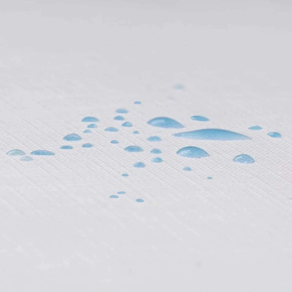Waterproof-style white mattress cover with blue splash pattern