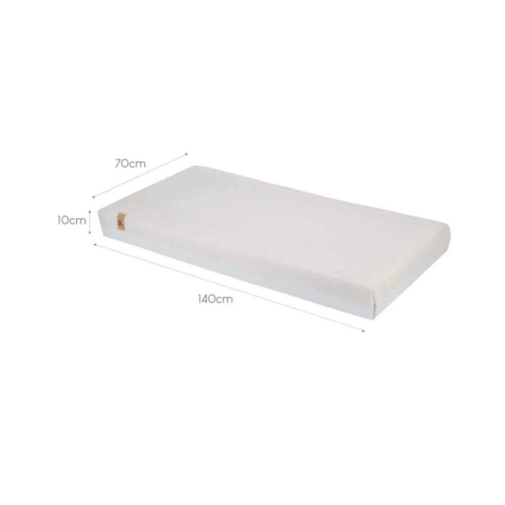 Cot bed mattress labeled 140 x 70 cm, white cover, angled top view.