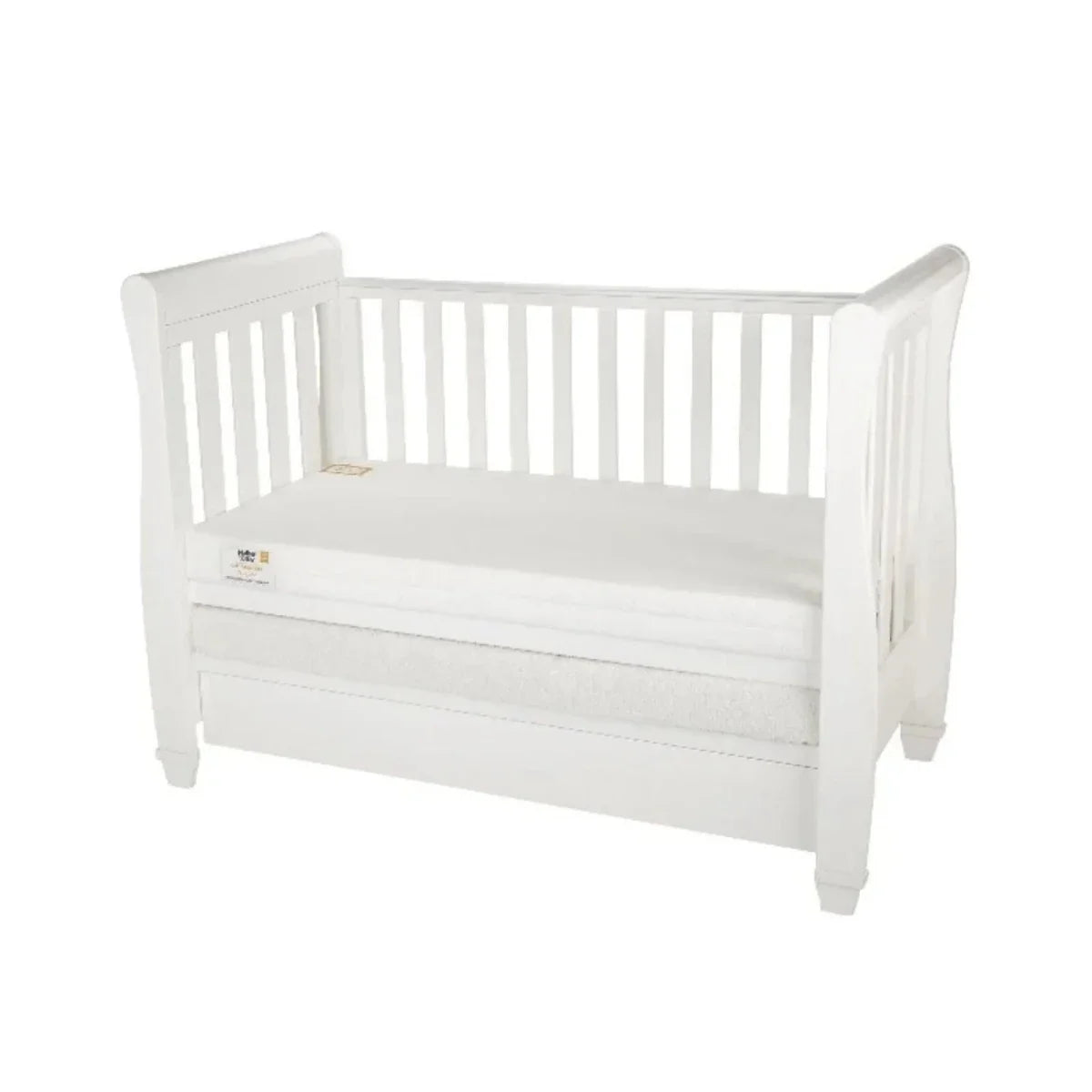 White cot mattress placed in a white wooden cot frame, quilted cover