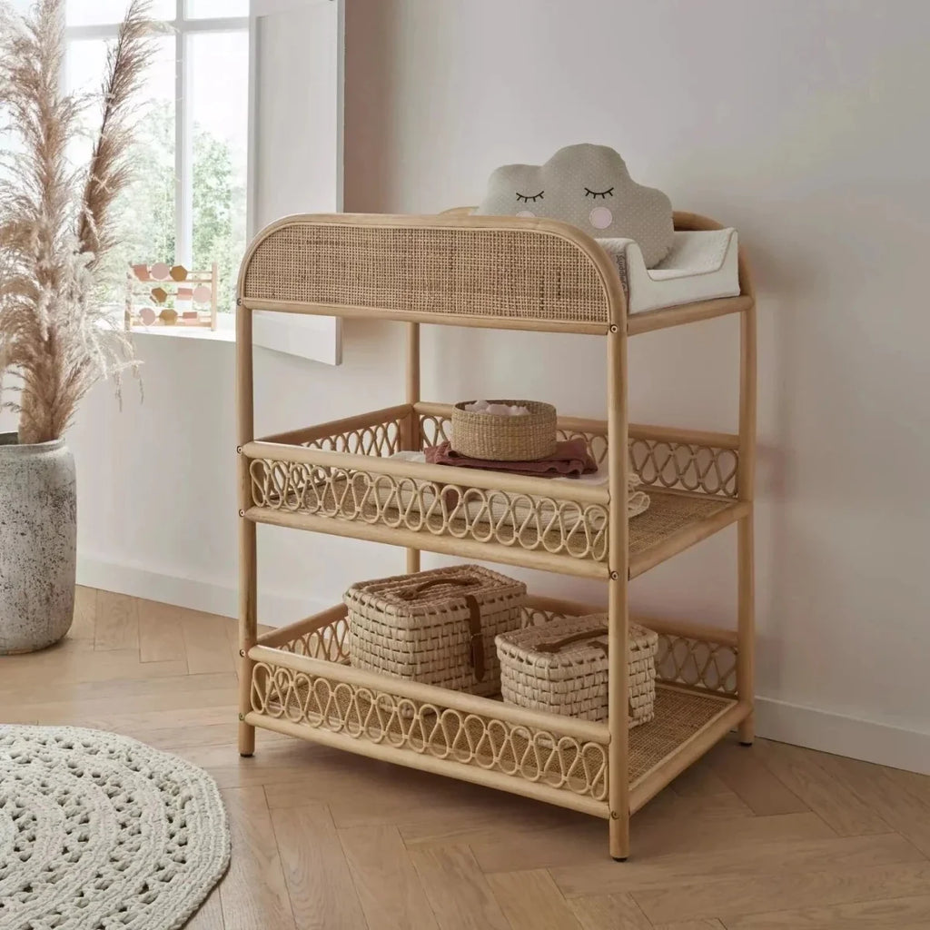 Natural rattan changing table with 3 open storage shelves and curved top panel