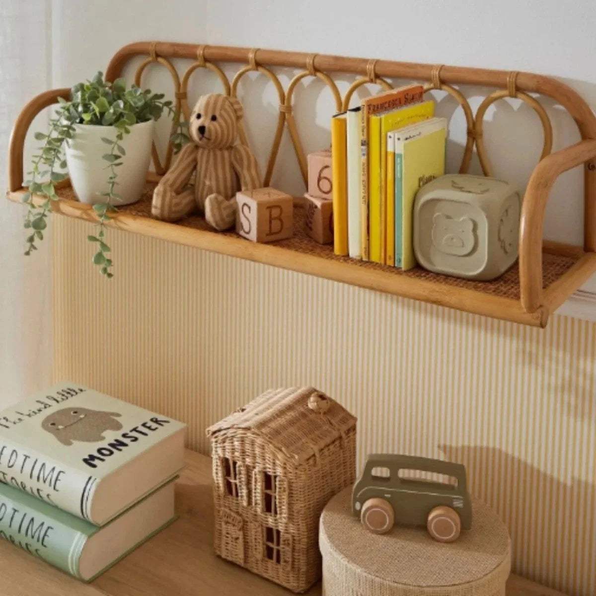 Small rattan shelf with arched top, looped front panel, and woven shelf base
