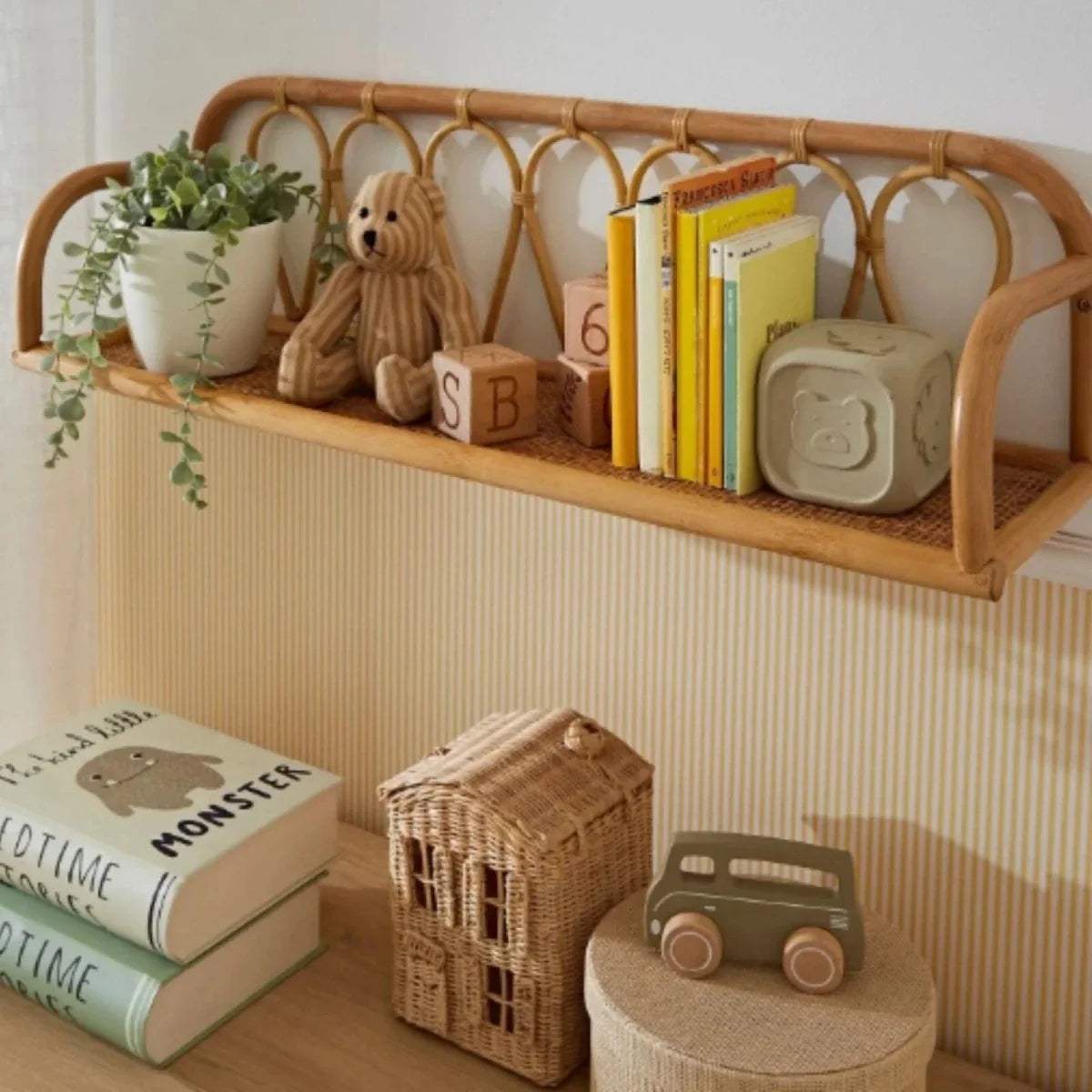Rattan nursery shelf with curved top rail and woven base board