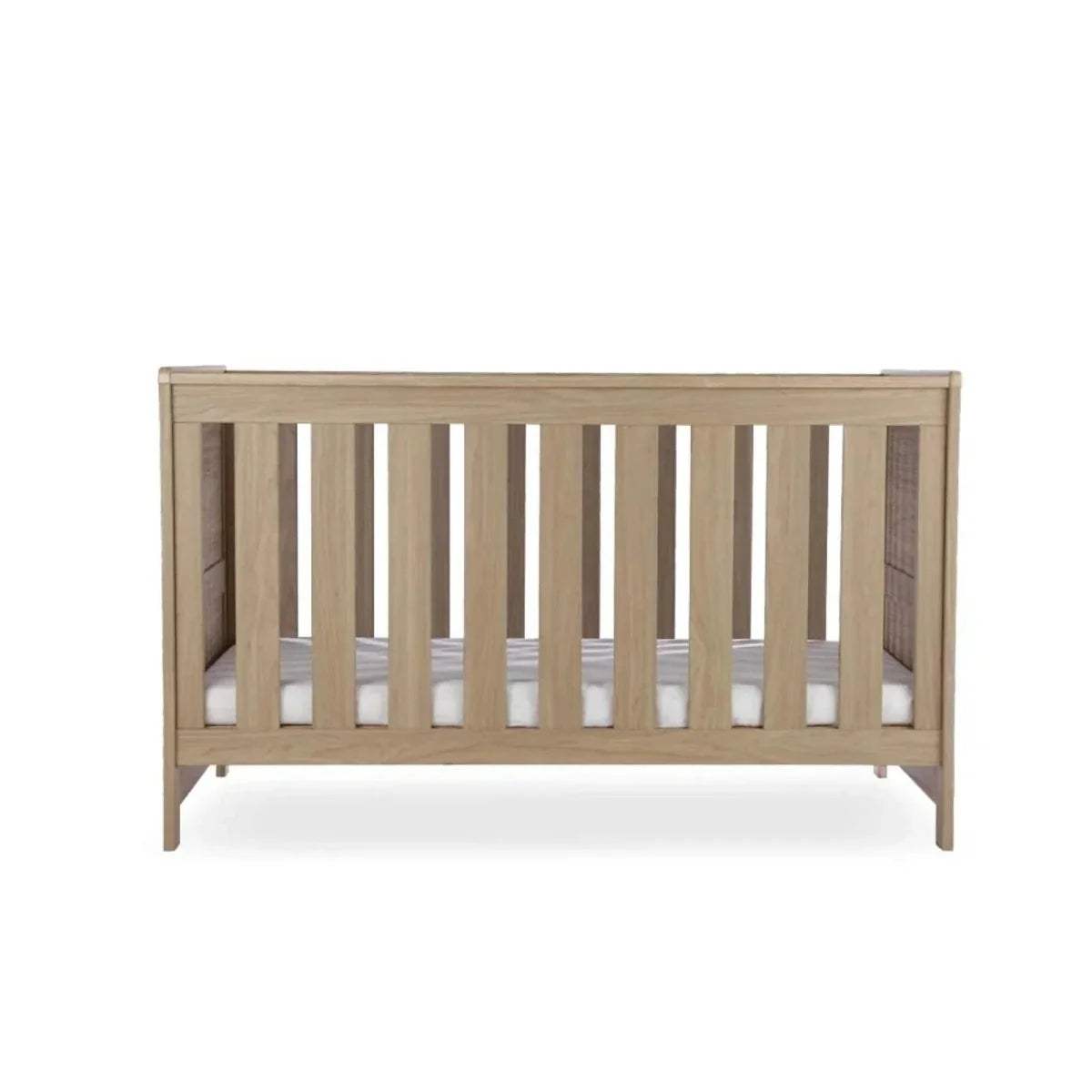 Oak cot bed frame with vertical slats and low guard rails