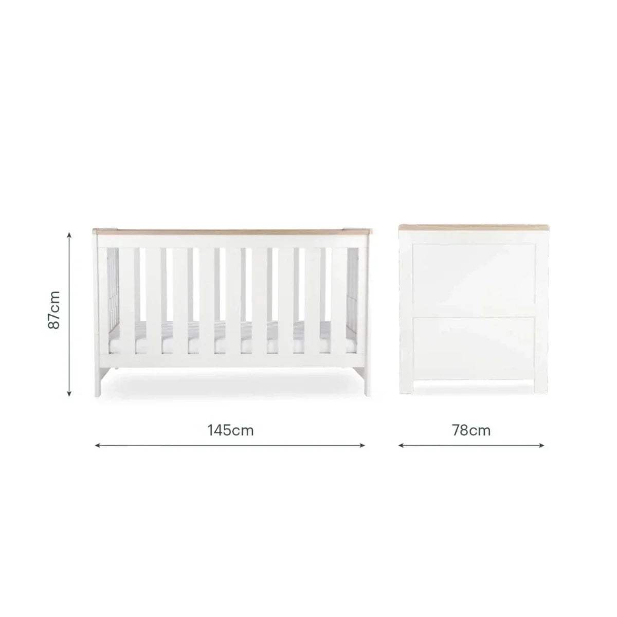 White cot bed with slatted sides shown with height and width dimensions